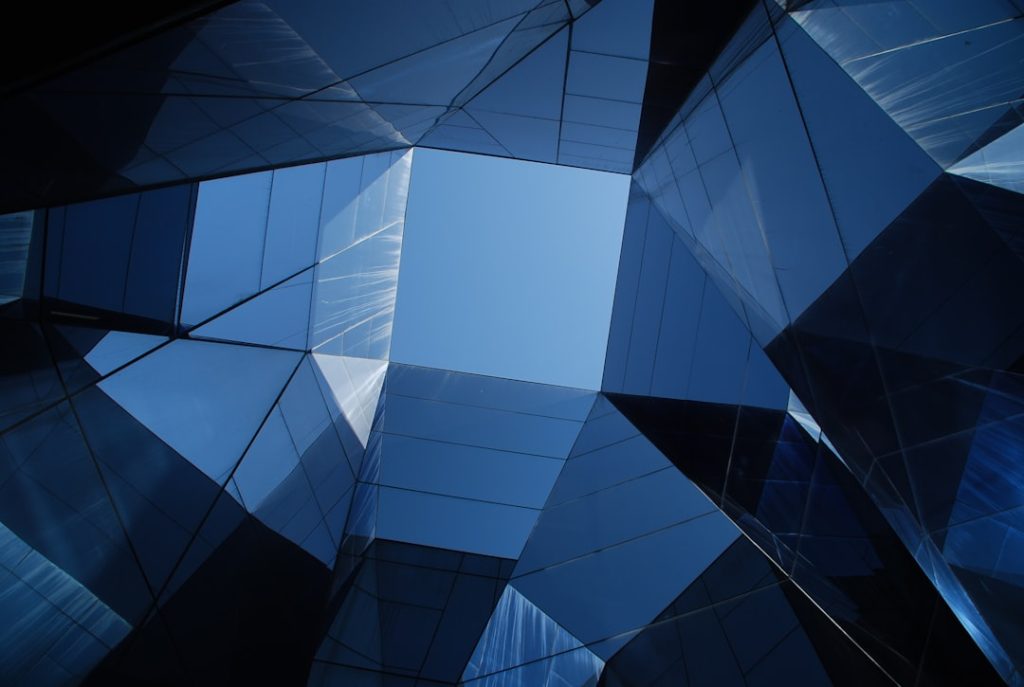 low-angle-photo-of-curtain-wall-building-1fxmet2u5du